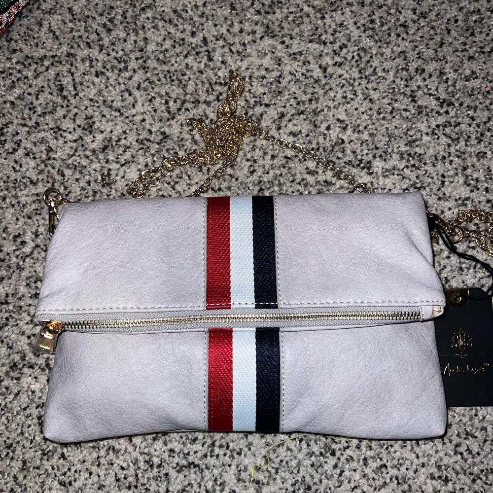 Amazing Jules grey purse/ opens up into rectangle shape . With zipper